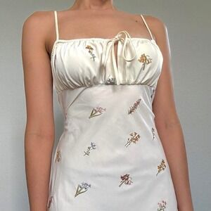 Cream and white embroidered floral maxi dress by WeWoreWhat